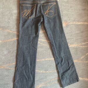 Micheal Kors faded medium wash jeans